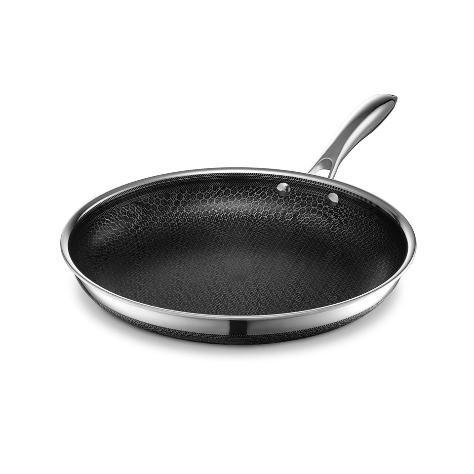 HexClad Hybrid 12-inch pan top view with hex pattern and durable handle