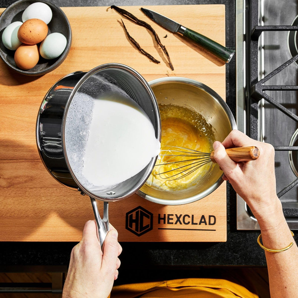 HexClad Hybrid 2-Quart with ingredients demo: boiling eggs and oats.