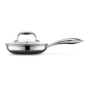 HexClad Hybrid 7-inch pan with tempered glass lid for easy monitoring while cooking.