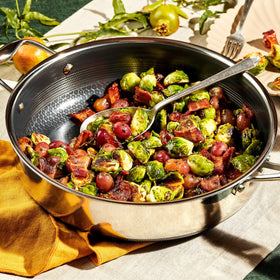 HexClad tempered glass lid offering a clear view during simmering and braising.