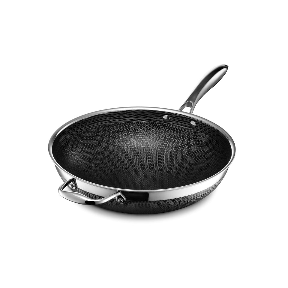 HexClad Hybrid 12-inch nonstick wok with laser-etched surface for even searing.