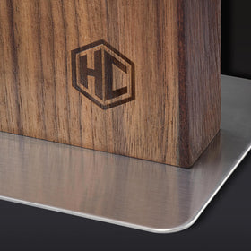 HexClad walnut block stands freely on the counter with sturdy support.