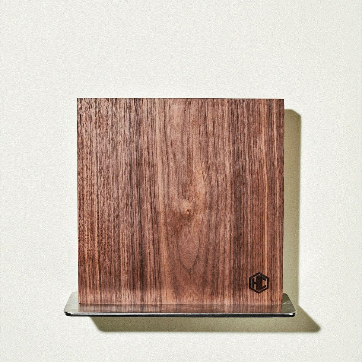 Padded stainless-steel base keeps the block stable on any surface.