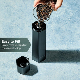 HexClad pepper mill showing no-mess bottom cap for clean counters.