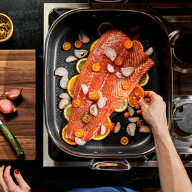 HexClad roasting pan rack insert keeps roast elevated for better juices.