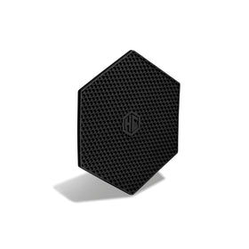HexClad silicone trivet close-up shows pliable texture and non-slip grip