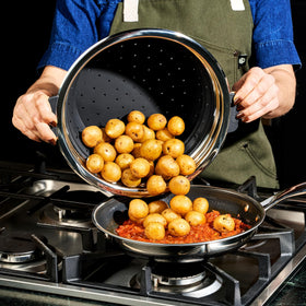 HexClad steamer basket is dishwasher-safe for quick cleanup.