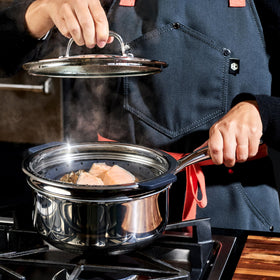 HexClad steamer basket nests flat for compact kitchen storage.