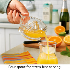 Pointed reamer rapidly releases juice from oranges, lemons, and limes