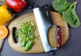 HIDAMOS cleaver on a cutting board ready for versatile kitchen prep