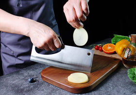 HIDAMOS meat cleaver in action slicing kale and radish in kitchen prep