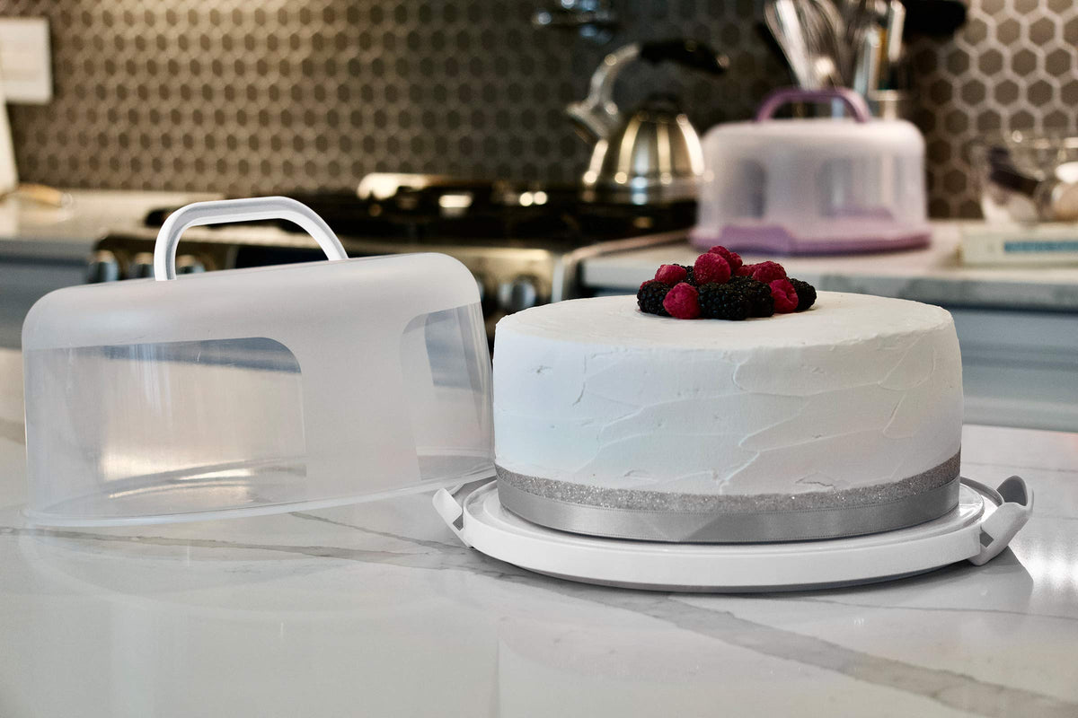 Clear cover showing cake design while protecting from dust during display.