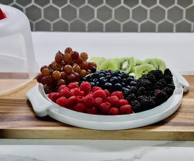 Portable cake stand by Highball & Chaser for 10-inch cakes and desserts.