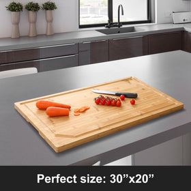 HIWARE bamboo cutting board showing juice groove catching liquids during prep.