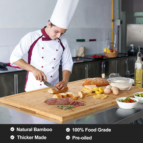 HIWARE cutting board doubles as stove-top cover for extra kitchen workspace.