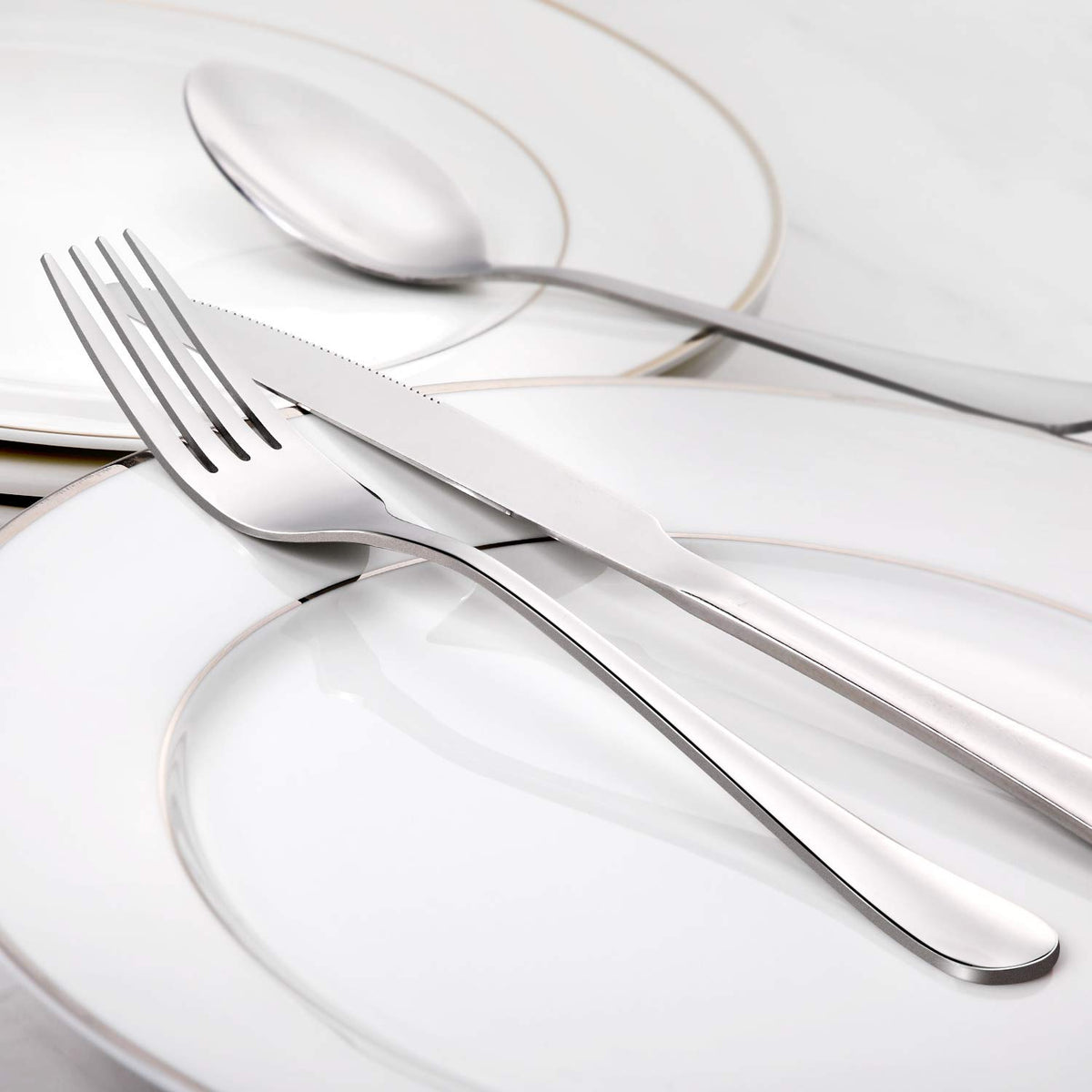 Closeup of HIWARE extra-fine stainless steel forks showing durability