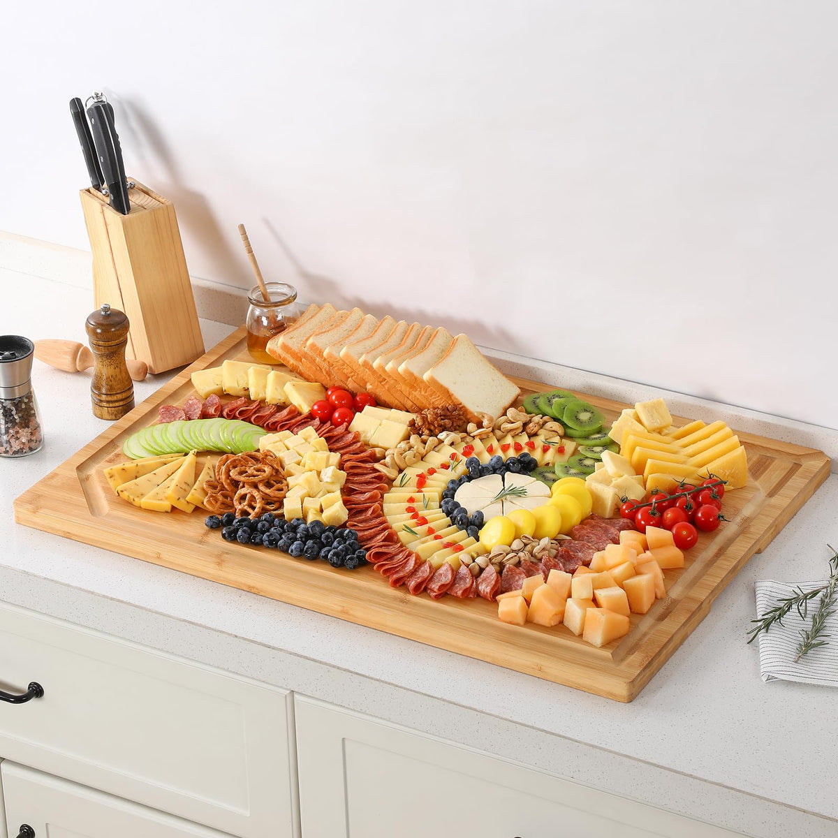 HIWARE multifunction board on a kitchen island adds surface space.