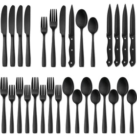 Hiware matte black silverware set on a four-person dining table for stylish everyday meals.