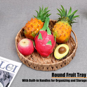 HJAYUXYO round wicker tray serves fruit and tea on a stylish table.