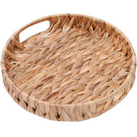HJAYUXYO round woven tray with handles on a coffee table for easy transport.