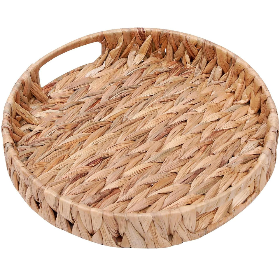 HJAYUXYO round woven tray with handles on a coffee table for easy transport.