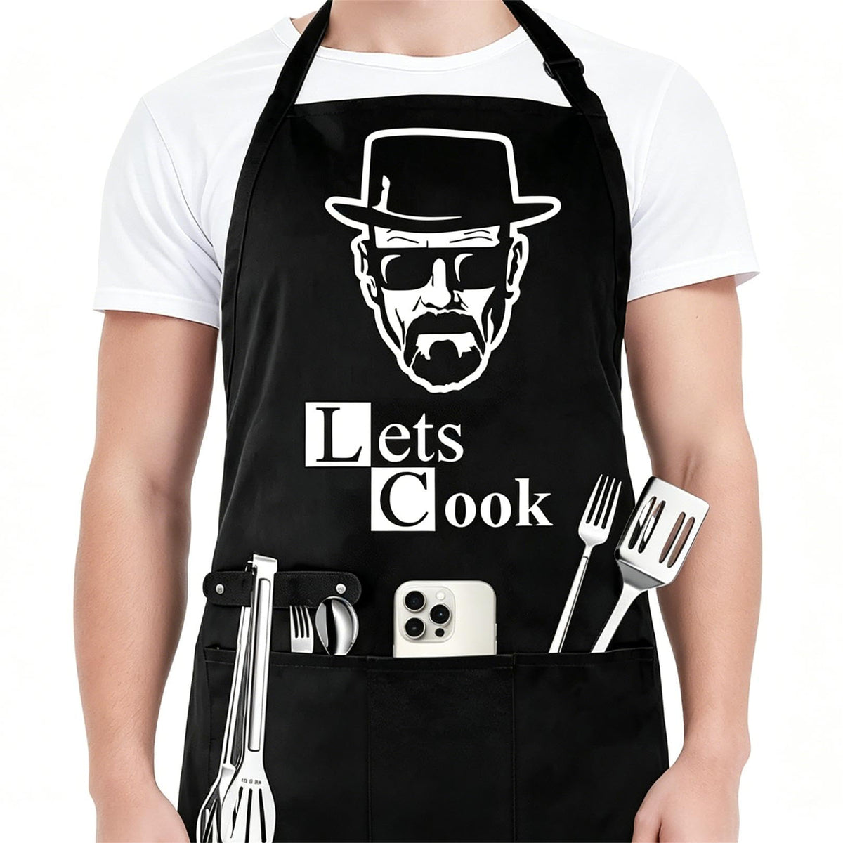 Hkmmdvc Lets Cook apron front view showcases playful design for grilling and home cooking.