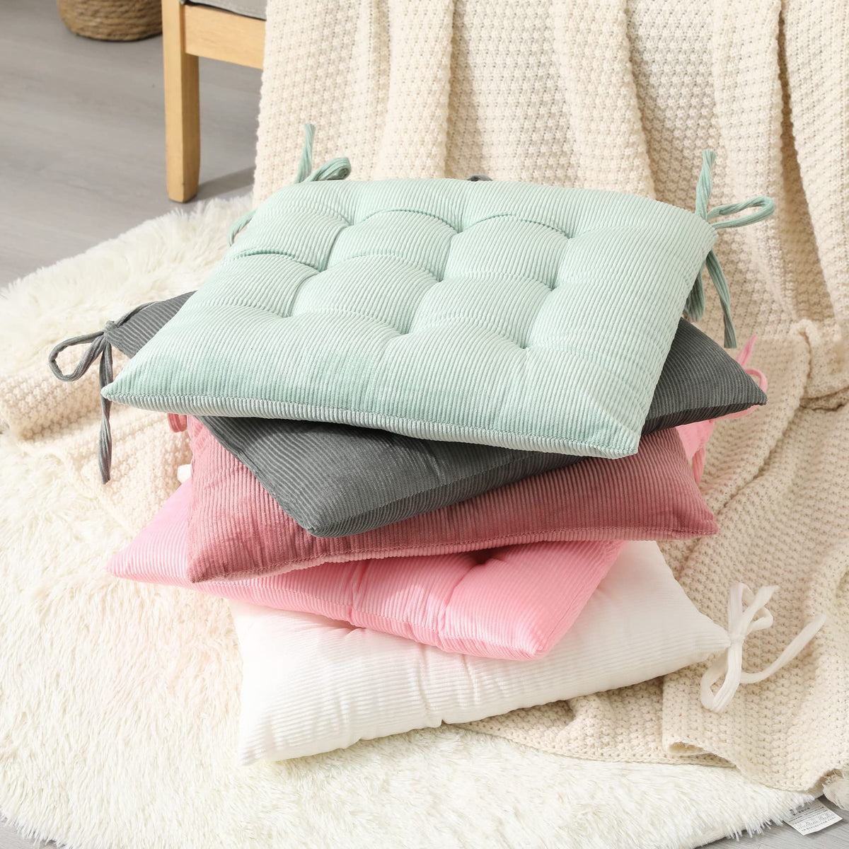 HLOVME pink cushion in office setting offers gentle support.