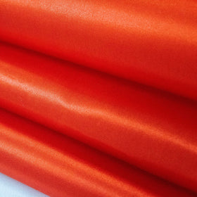 Close-up of HMQIANG satin fabric highlighting a smooth drape.