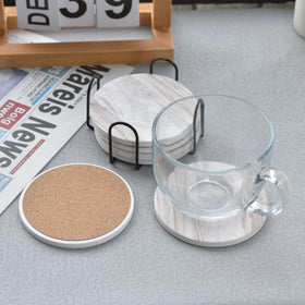 Hoewina coasters on a coffee table protect the surface.