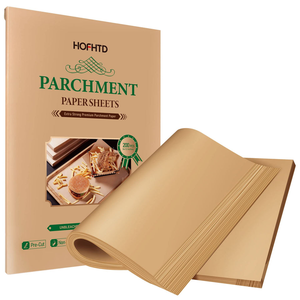HOFHTD precut parchment paper 9x13 laid flat on a pan for consistent baking.