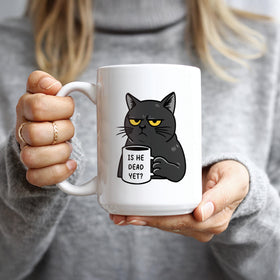 Hogg Is He Dead Yet mug, held by handle for a comfortable morning ritual.