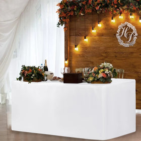 HolidayIdeas fitted tablecloth close-up shows light-filtering fabric with subtle backlighting.