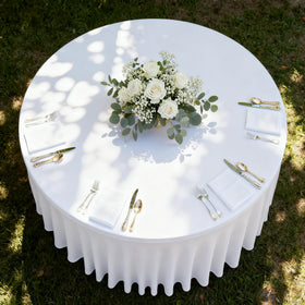 HolidayIdeas white floor-length ruffle table skirt hides legs for a polished banquet.
