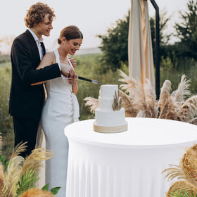 HolidayIdeas wrinkle-resistant table skirt maintains a smooth, formal look.