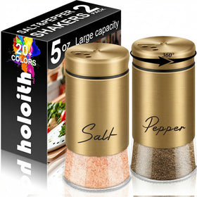 Holoith gold salt and pepper shakers 5oz on a dining table for elegant seasoning.