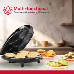 Holstein Housewares Arepa Maker dough balls ready to cook for quick snacks.