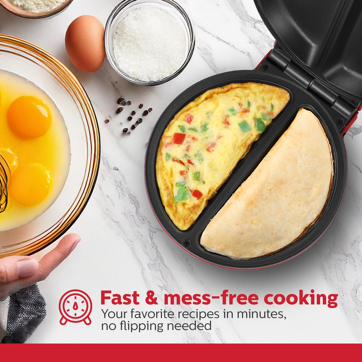 Holstein two-portion omelet maker ready for two different fillings, ideal for busy mornings.