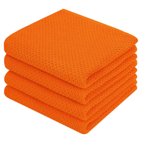 Homaxy orange waffle dish towels folded, showcasing soft texture and absorbent capacity.