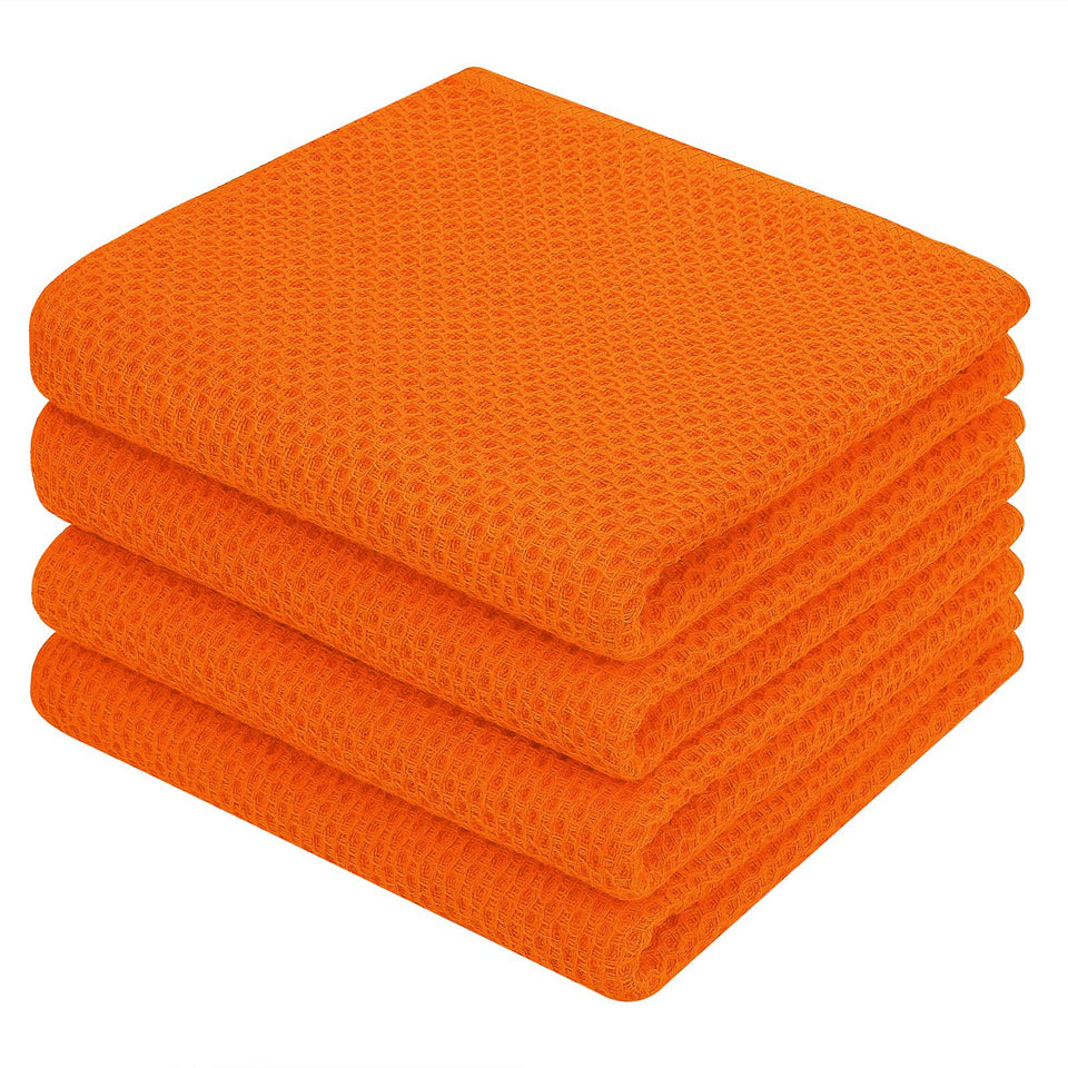 Homaxy orange waffle dish towels folded, showcasing soft texture and absorbent capacity.