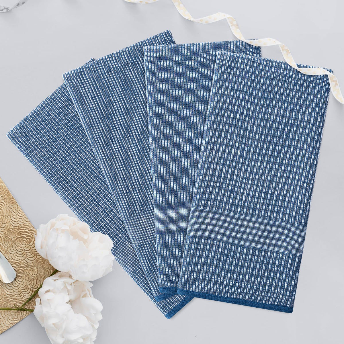 Homaxy navy towels stack neatly for easy storage.