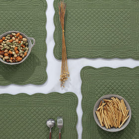 Six placemats arranged on a dining table for indoor or outdoor use.
