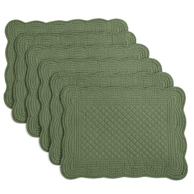 HOMBYS quilted placemats in emerald green protect the table from heat and spills.