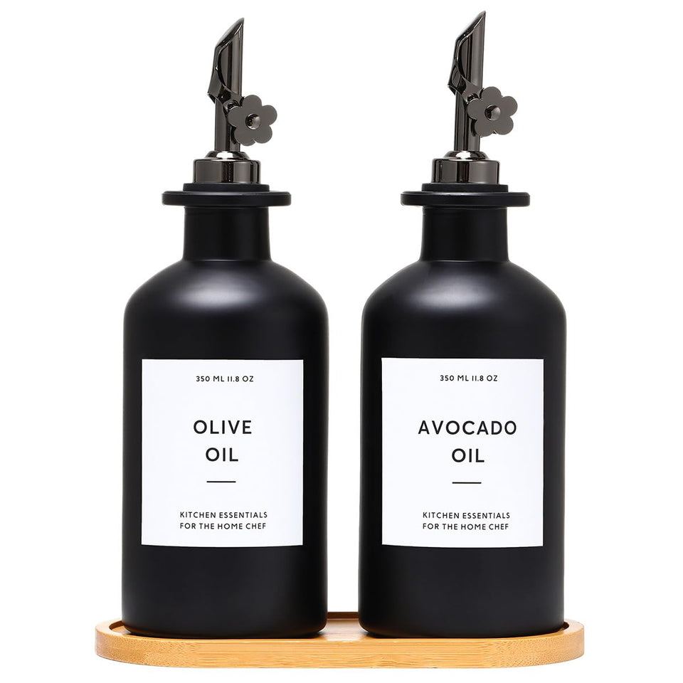 HOMCDALY olive oil dispenser bottles on the counter for controlled, mess-free pouring.