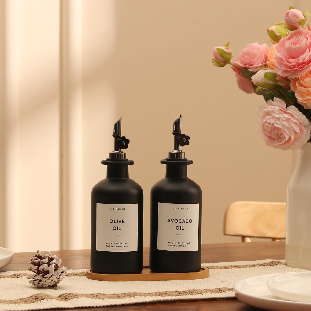 HOMCDALY opaque glass bottles shield oil from light to help preserve flavor.