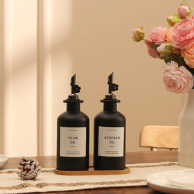 HOMCDALY opaque glass bottles shield oil from light to help preserve flavor.
