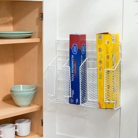 Home Basics wall or cabinet door mount saves counter space.