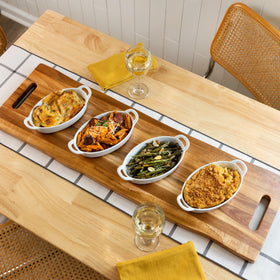 Home Beets acacia serving board ideal for serving meat and cheese.