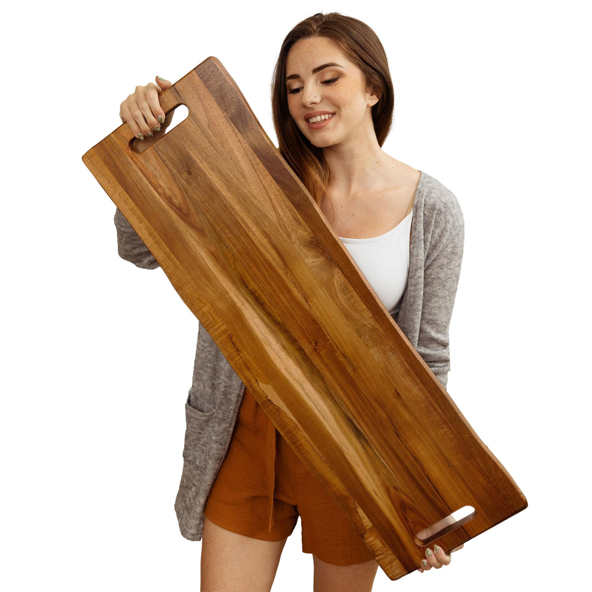 Home Beets large acacia board with handles for easy transport and service.