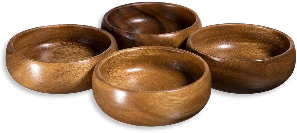 Home Essentials Acacia dip bowls: four hand-carved calabash bowls for appetizers and dips.