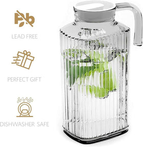 Home Essentials & Beyond clear glass pitcher shows contents with ergonomic handle